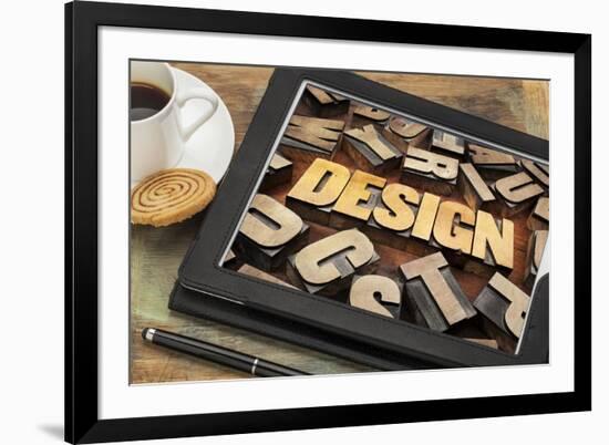 Design Word Abstract in Letterpress Wood Type on a Digital Tablet with Cup of Coffee-PixelsAway-Framed Art Print