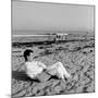 Designer Charles Eames Sitting on a Beach Near His Home-Peter Stackpole-Mounted Premium Photographic Print