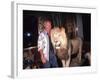 Designer Gianni Versace Beside Stuffed Lion at Sly Stalone's Home-null-Framed Premium Photographic Print