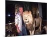 Designer Gianni Versace Beside Stuffed Lion at Sly Stalone's Home-null-Mounted Premium Photographic Print