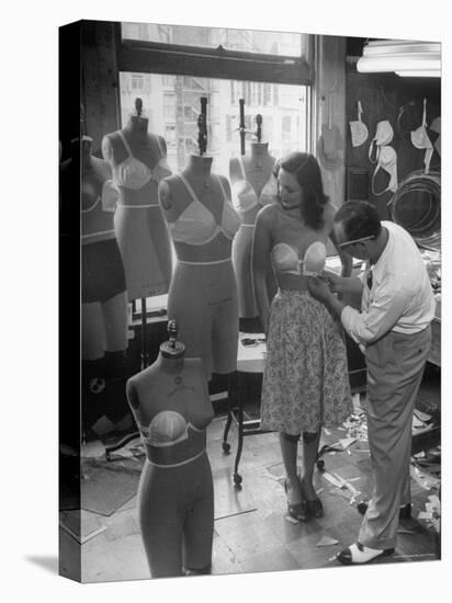 Designer Jack Glick Fitting a Strapless Bra on Model-Nina Leen-Stretched Canvas