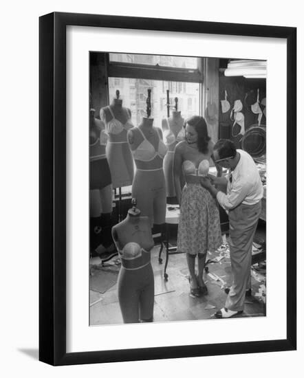 Designer Jack Glick Fitting a Strapless Bra on Model-Nina Leen-Framed Photographic Print