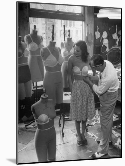 Designer Jack Glick Fitting a Strapless Bra on Model-Nina Leen-Mounted Photographic Print
