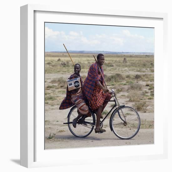 Despite their Traditional Dress, Two Young Maasai Give Hints That Lifestyle Is Changing in Tanzania-Nigel Pavitt-Framed Photographic Print