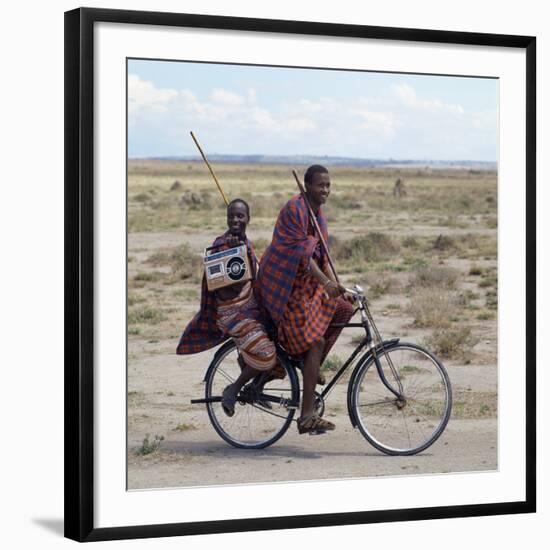 Despite their Traditional Dress, Two Young Maasai Give Hints That Lifestyle Is Changing in Tanzania-Nigel Pavitt-Framed Photographic Print