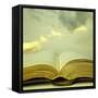 Detail of an Old Holy Bible Open with a Beautiful and Mystical Sky in the Background in a Golden Li-Valentina Photos-Framed Stretched Canvas