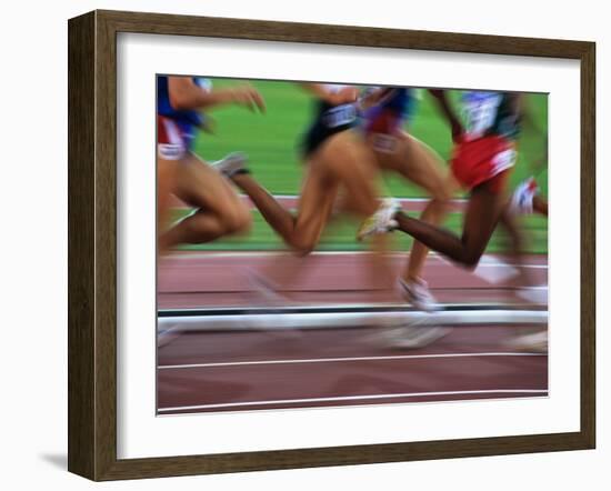 Detail of Blurred Action of Legs in Womens Race-Paul Sutton-Framed Photographic Print