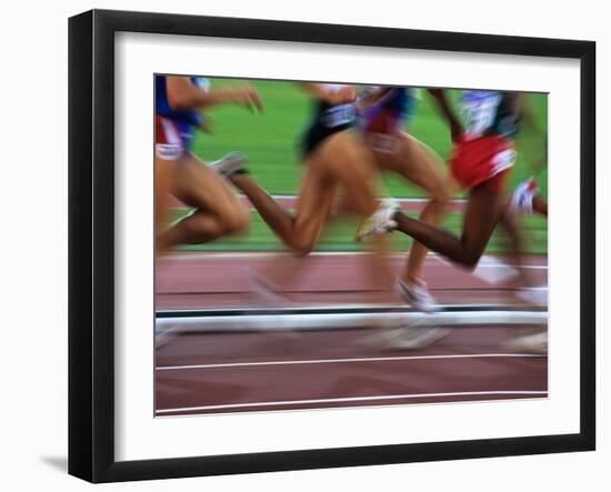 Detail of Blurred Action of Legs in Womens Race-Paul Sutton-Framed Photographic Print