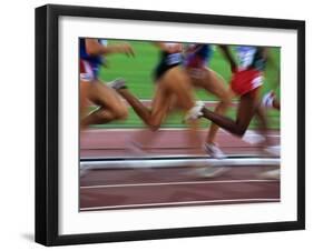 Detail of Blurred Action of Legs in Womens Race-Paul Sutton-Framed Photographic Print
