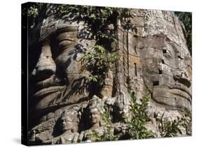 Detail of Carved Faces at Baray Temple, Angkor Wat, Cambodia-Mark Hannaford-Stretched Canvas