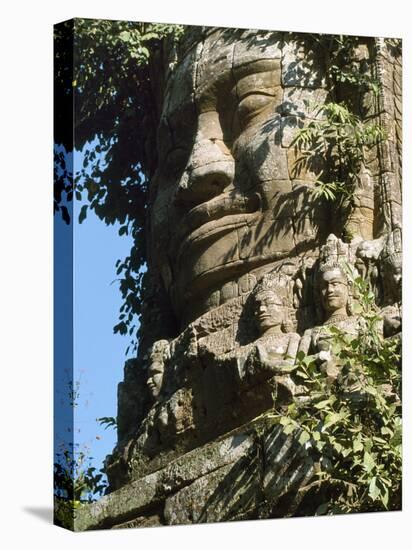 Detail of Carved Faces at Baray Temple, Angkor Wat, Cambodia-Mark Hannaford-Stretched Canvas