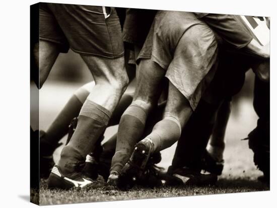 Detail of Feet of a Group of Rugby Players in a Scrum, Paris, France-null-Stretched Canvas