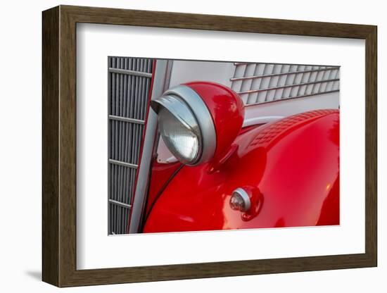 Detail of head lamp on red classic American Ford in Habana, Havana, Cuba.-Janis Miglavs-Framed Photographic Print