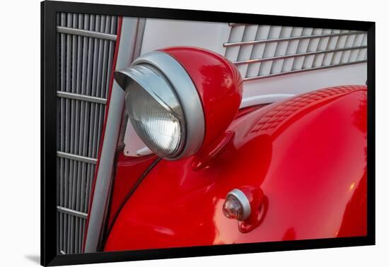 Detail of head lamp on red classic American Ford in Habana, Havana, Cuba.-Janis Miglavs-Framed Photographic Print