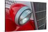 Detail of head light and grill on red classic American Ford in Habana, Havana, Cuba.-Janis Miglavs-Stretched Canvas