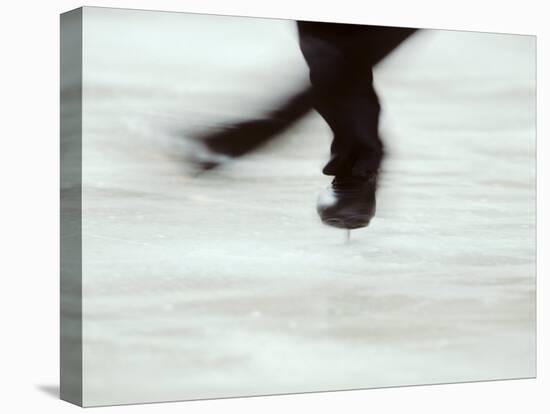 Detail of Male Figure Skater's Legs and Boots Spinning-Steven Sutton-Stretched Canvas