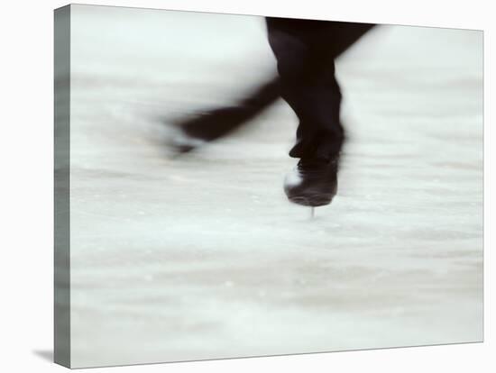 Detail of Male Figure Skater's Legs and Boots Spinning-Steven Sutton-Stretched Canvas