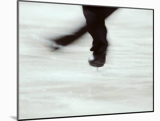 Detail of Male Figure Skater's Legs and Boots Spinning-Steven Sutton-Mounted Photographic Print