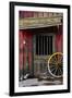 Detail of Old Wagon Wheel next to a Wooden Wild West Typical House-ccaetano-Framed Photographic Print