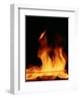 DETAIL OF ORANGE RED FLAMES OF A FIRE AGAINST BLACK BACKGROUND-Panoramic Images-Framed Photographic Print