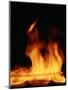 DETAIL OF ORANGE RED FLAMES OF A FIRE AGAINST BLACK BACKGROUND-Panoramic Images-Mounted Photographic Print