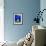 Detail of Potted Plant Against Blue Wall-Stephen Studd-Framed Photographic Print displayed on a wall