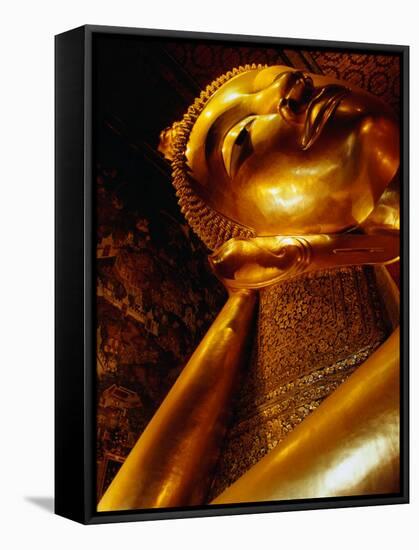 Detail of Reclining Buddha's Head at Wat Pho, Bangkok, Thailand-Ryan Fox-Framed Stretched Canvas