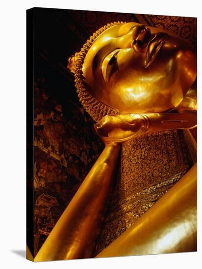 Detail of Reclining Buddha's Head at Wat Pho, Bangkok, Thailand-Ryan Fox-Stretched Canvas