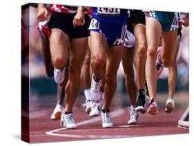 Detail of Runners Legs Competing in a Race-null-Stretched Canvas
