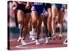 Detail of Runners Legs Competing in a Race-null-Stretched Canvas