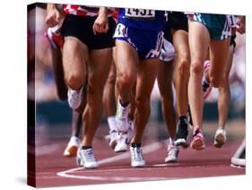 Detail of Runners Legs Competing in a Race-null-Stretched Canvas