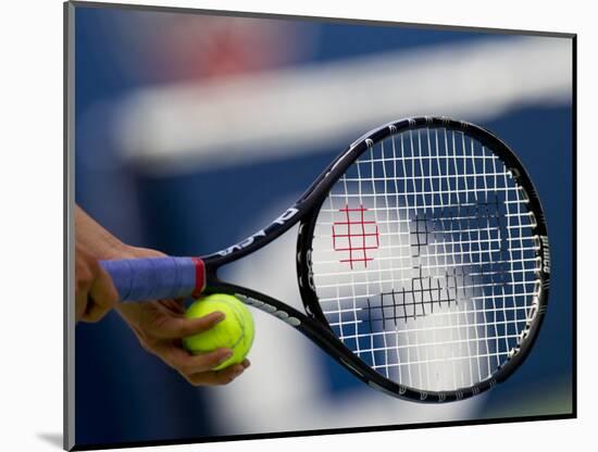 Detail of Tennis Player Holding the Racquet and Ball About to Serve-null-Mounted Photographic Print