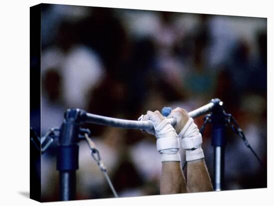 Detail of the Hands of Male Gymnast Grabing the High Bar-Paul Sutton-Stretched Canvas