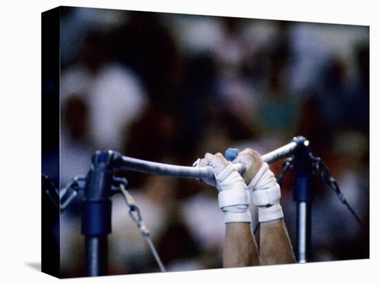 Detail of the Hands of Male Gymnast Grabing the High Bar-Paul Sutton-Stretched Canvas