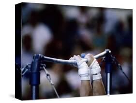 Detail of the Hands of Male Gymnast Grabing the High Bar-Paul Sutton-Stretched Canvas