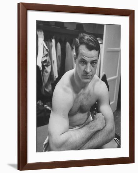 Detroit Red Wings Player Gordie Howe Sitting in the Dressing Room-null-Framed Premium Photographic Print