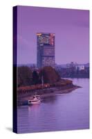 Deutsche Post Tower by Rhein River at dusk, Bonn, North Rhine-Westphalia, Germany-null-Stretched Canvas