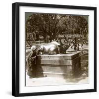 Devout Woman Stroking a Bronze Bull to Cure Rheumatism, Kitano Tenjin Temple, Kyoto, Japan, 1904-Underwood & Underwood-Framed Photographic Print