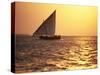 Dhow in Silhouette on the Indian Ocean at Sunset, off Stone Town, Zanzibar, Tanzania, East Africa-Lee Frost-Stretched Canvas
