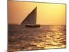 Dhow in Silhouette on the Indian Ocean at Sunset, off Stone Town, Zanzibar, Tanzania, East Africa-Lee Frost-Mounted Photographic Print