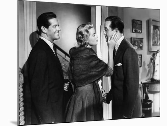 DIAL M FOR MURDER, 1954 directed by ALFRED HITCHCOCK Robert Cummings, Grace Kelly and Ray Milland (-null-Mounted Photo