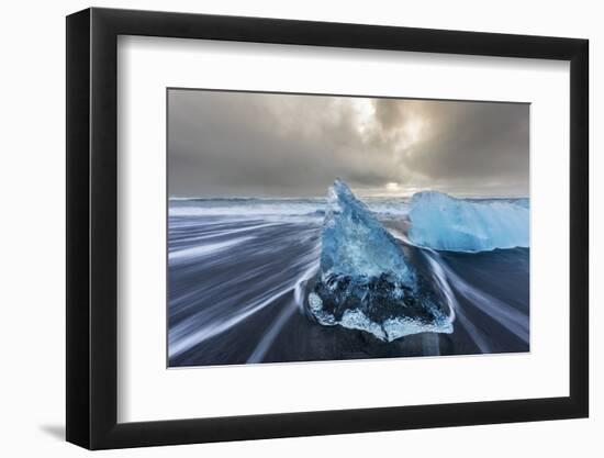 Diamond ice chards from calving icebergs on black sand beach, Jokulsarlon, south Iceland-Chuck Haney-Framed Photographic Print