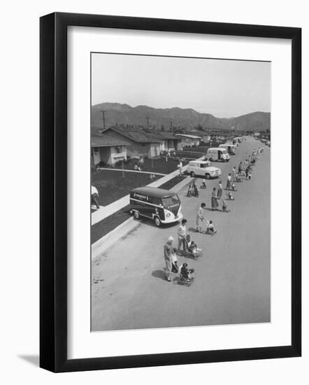 Diaper Service Trucks and Mothers with Babies They Service Line Street-Ralph Crane-Framed Photographic Print