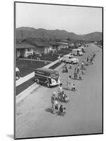 Diaper Service Trucks and Mothers with Babies They Service Line Street-Ralph Crane-Mounted Photographic Print