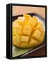 Diced Mango Still Attached to the Skin on Brown Plate-null-Framed Stretched Canvas