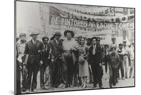 Diego Rivera and Frida Kahlo in the May Day Parade, Mexico City, 1st May 1929-Tina Modotti-Mounted Photographic Print
