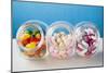 Different Kinds of Sweets in Three Sweet Jars-Foodcollection-Mounted Photographic Print