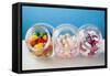 Different Kinds of Sweets in Three Sweet Jars-Foodcollection-Framed Stretched Canvas