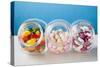 Different Kinds of Sweets in Three Sweet Jars-Foodcollection-Stretched Canvas