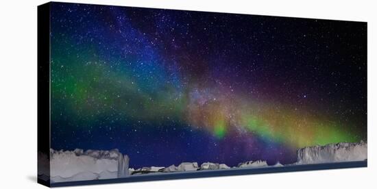 Digital Composite - Aurora Borealis or Northern Lights in Iceland and Icebergs in Greenland-null-Stretched Canvas